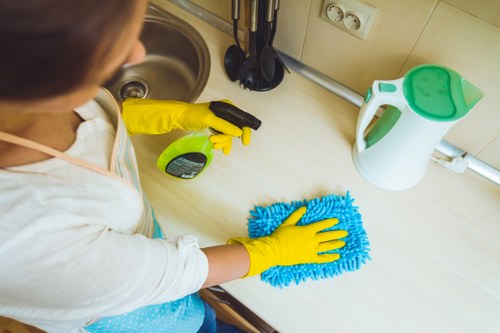 Professional cleaner confirming appointment details