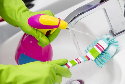 Manager reviewing ethical compliance in a cleaning business